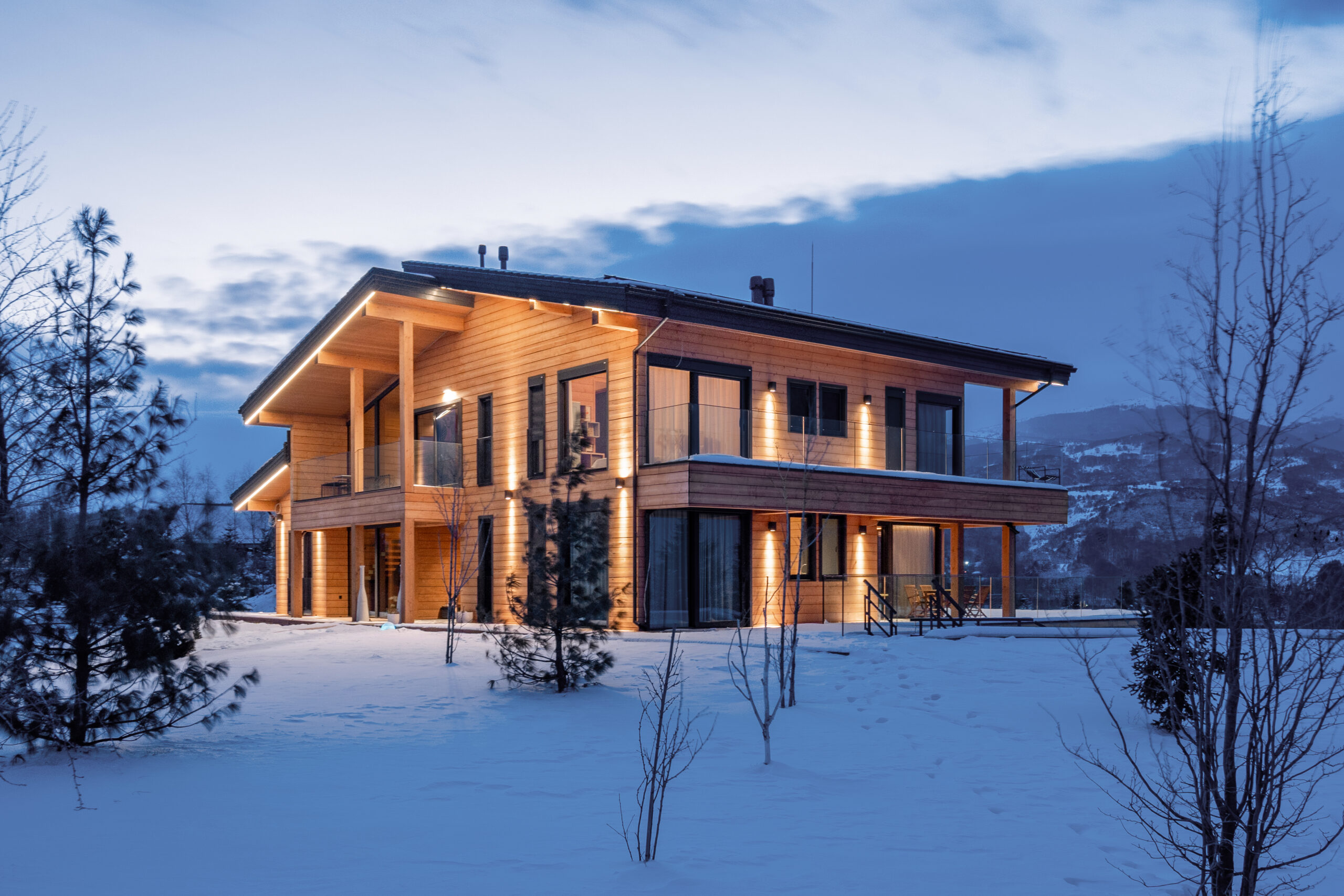 Private Residence, Sofia, Bulgaria — the residence at dusk with the mountain landscape behind